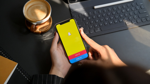 chiang-mai-thailand-february-1-2020-female-holding-iphone-with-snapchat-screen-snapchat-is-multimedia-messaging-app_67155-6062